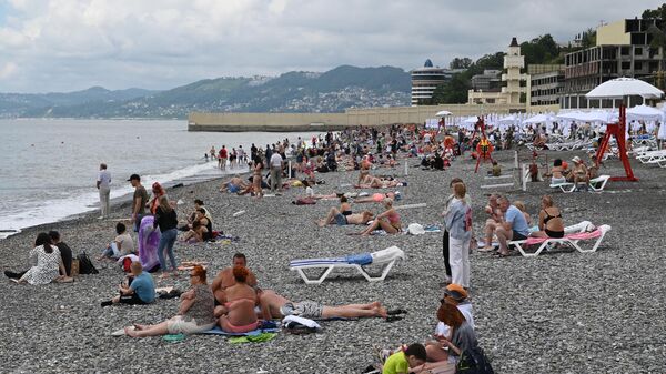 Vacationers on the Riviera beach in Sochi